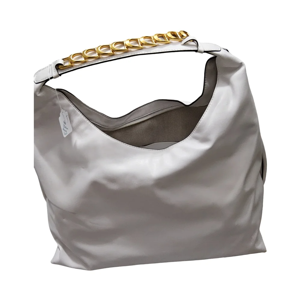 Customer Return Donna Karan White Hobo Bag with flaws will take reasonable offer
